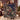 Couple holding a personalized hellebore garden woven blanket with custom name woven in