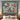 Hellebore Ornament Christmas woven blanket displayed as a wall tapestry above a bed