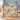 Couple holding a Heron Marsh Garden woven blanket throw