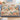 Heron Marsh Garden woven blanket draped over a sofa