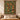 Holly orange trellis woven blanket displayed as a Christmas wall tapestry above a bed