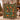 Couple holding a personalized holly orange trellis woven blanket with custom name woven in