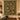Holly orange trellis woven blanket shown as festive winter wall decor