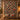 Holly Ribbon Hens quilt hung on a wall above a bench with 2 matching pillowcases
