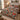 Holly Ribbon Hens quilt bedding set with 2 matching pillowcases on a made bed