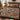 Holly Ribbon Hens Christmas woven blanket spread across a bed in a holiday bedroom