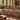 Hop & Wild Clematis woven blanket draped over a sofa in a living room