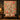 Hummingbird Blush Fountain Garden quilt hung on a wall above a bench with 2 matching pillowcases