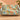 Hummingbird Trumpet Garden woven blanket draped over a sofa