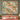 Hummingbird Trumpet Garden woven blanket design shown without a name as a wall tapestry above a bed
