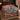 Indigo Vermilion Koi Garden Pattern woven blanket spread on a bed with tea house and koi scenes