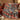 Indigo Vermilion Koi Garden Pattern woven blanket draped over a red sofa