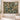 Japanese Anemone Sundial Garden woven blanket hanging as a wall tapestry beside an armchair