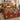 Legend of the Poinsettia quilt bedding set with 2 matching pillowcases on a bed with Christmas decor