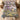 Lilac Dovecote Meadow quilt bedding set with 2 matching pillowcases on a bed in a cozy bedroom