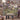 Couple holding a personalized Lilac Dovecote Meadow woven blanket with custom family name