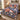 Lion and Lamb Star of Bethlehem quilt bedding set with 2 matching pillowcases on a bed with holiday decor