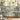 Lotus Goldfish Pond woven blanket draped over a sofa in a living room