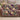 Luna Moth Moonflower woven blanket draped over a sofa