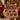 Fireplace mantel and stockings eight photo collage fleece blanket draped over a red sofa