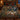 Mistletoe Oak Night Woods woven blanket with custom family name spread on a bed