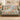 Monarch Prairie woven blanket draped over a sofa