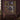 Moonlit Black Swan Willow Lake woven blanket displayed as a wall tapestry above a candlelit console on a plum wall