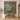 Personalized stag and doe woodland quilt with custom name The Carters hung on a wall above a bench with matching pillowcases