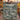 Holding a personalized mountain cabin woven blanket with custom name woven in