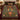 Mum urn bouquet woven blanket spread on a bed