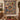 Nativity Patchwork Quilt Look woven blanket displayed as a wall tapestry above a dining table with Advent candles