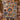 Couple holding a personalized Nativity Patchwork Quilt Look woven blanket with custom family name woven in