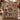 Nativity Patchwork Quilt Look woven blanket draped over a staircase banister with garland
