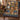 Nativity Story Mini Scenes woven blanket draped over a wooden armchair with a blue cushion