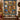 Personalized Nativity Story quilt with custom family name hung on a wall above a bench with matching pillowcases