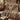 Nature journal woven blanket draped over a sofa