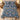 Navy Tulip Songbird Morris Style quilt bedding set with 2 matching pillowcases on a bed in a cozy bedroom