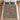 Nordic Floral Cottage woven blanket spread on a bed