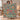 Holding a personalized Nordic Floral Cottage woven blanket with custom family name woven in