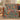 Nordic Floral Cottage woven blanket draped over a sofa
