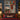 Nordic Village Lights woven blanket displayed as a Christmas wall tapestry above a bed