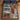 Nordic Village Lights woven blanket spread on a bed