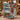 Holding a personalized Nordic Village Lights woven blanket with custom family name woven in