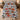 North Pole Village quilt bedding set with 2 matching pillowcases on a bed in a festive bedroom