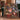 Nutcracker storybook woven blanket draped over a green velvet armchair