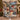 Holding a personalized Nutcracker Snowy Courtyard woven blanket with custom family name woven in