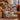 Nutcracker Snowy Courtyard woven blanket draped over a leather sofa