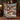 Couple holding a personalized Nutcracker Snowy Courtyard woven blanket with custom names woven in