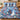 Personalized Painterly Blue Christmas Grove quilt bedding set with custom family name and 2 matching pillowcases on a bed
