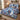 Painterly Blue Christmas Grove quilt bedding set with 2 matching pillowcases on a bed with Christmas decor